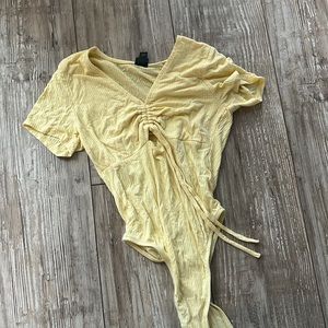 Yellow body suit